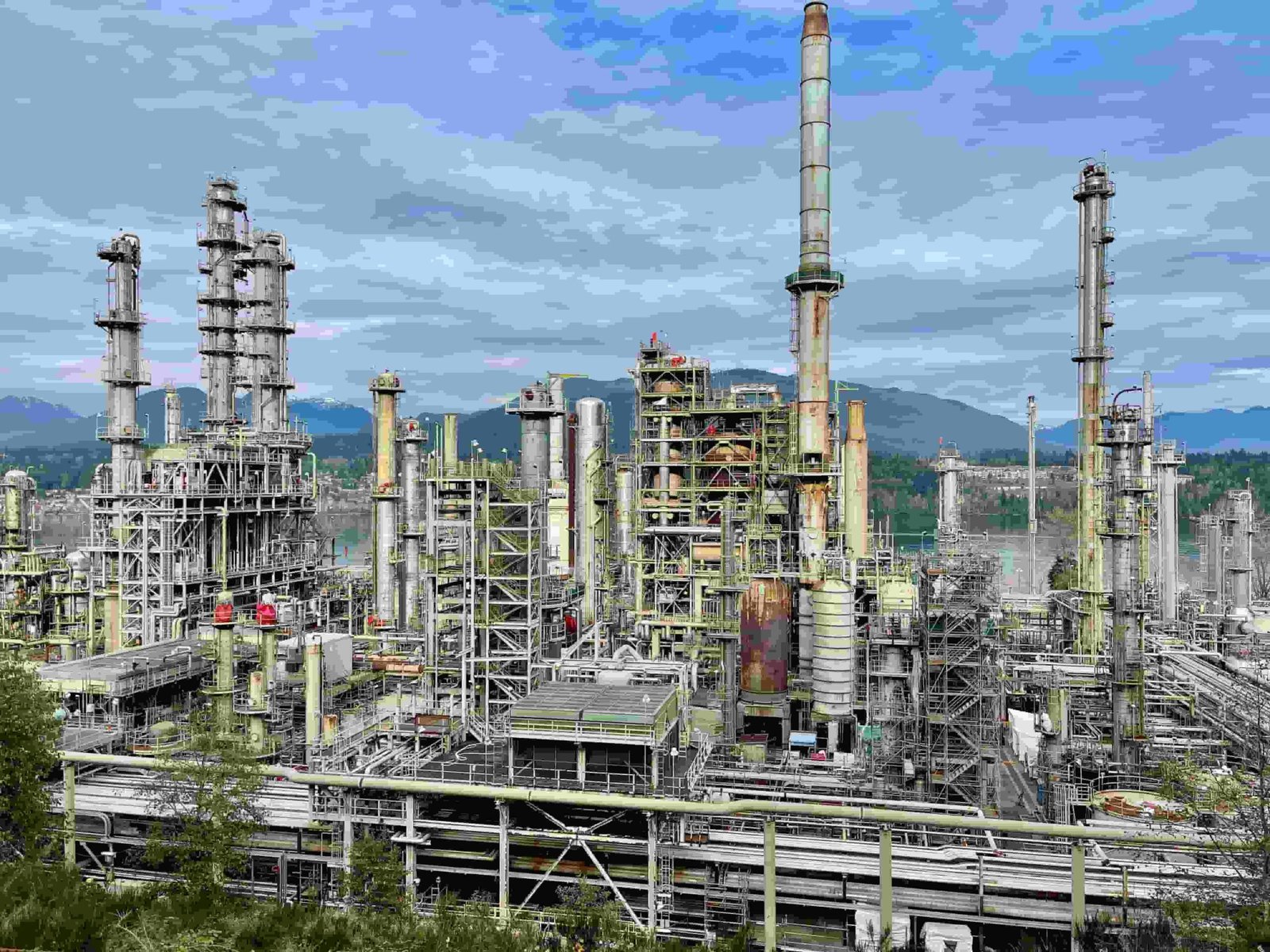 Oil refinery representing enterprise resource planning (ERP) software for oil and gas companies.